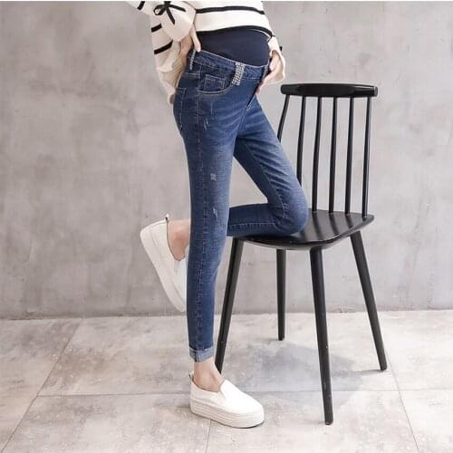 Spring and summer low waist maternity pants maternity wear casual pants feet stomach lift pants hole stomach lift denim pants