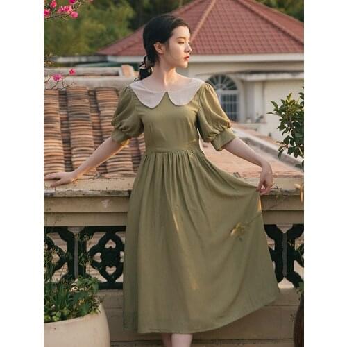 2021 summer new womens pastoral style girl young style embroidered leaking back thin puff sleeve doll collar mid-length dress