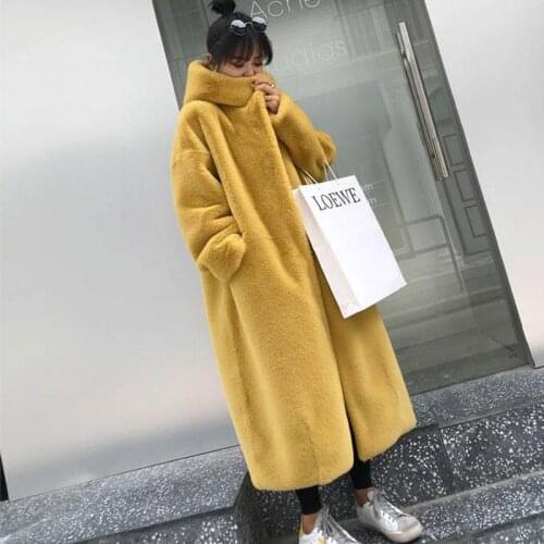 Hooded fluffy coat Oversize Hooded Faux Fur Coat Winter jacket Women Fashion Long Parka Thick Warm abrigo Female Loose jackets
