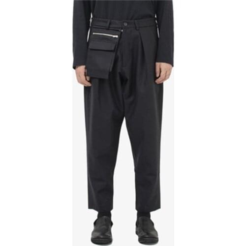 Autumn and winter new Japanese design feeling jiufen trousers men retro simple black leggings pocket exposed decoration