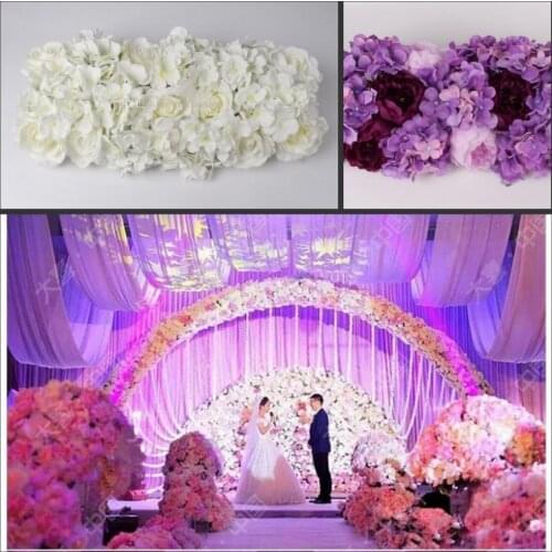 Wedding silk flower row arrangement artificial hydrangea rose flower arche row cappuccino background t-station road flower decor