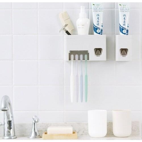 Toothbrush holder in bathroom adhesive toothpaste holder wall hanging automatic toothpaste extruder toothbrush holder