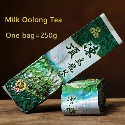Chinese Taiwan Milk Oolong Tea Beauty Weight loss Lowering Blood Pressure High Mountains JinXuan Milk Oolong Tea Fresh Green