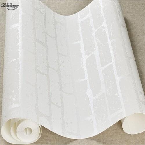 Beibehang non-woven 3D concave and convex three-dimensional pure white brick wallpaper relief brick clothing store shopping mall