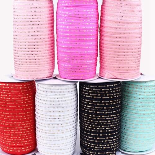 5/8" gold foil arrows FOE fold over elastic 100yards