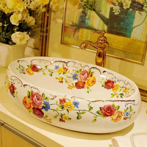 Elliptical white lavabo with flower-shaped lavabo