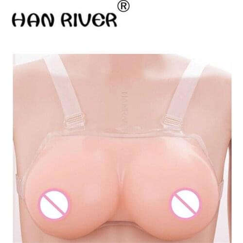 A pair concave E cup is a male and female CD fake breast with a fake breast and a fake breast implants