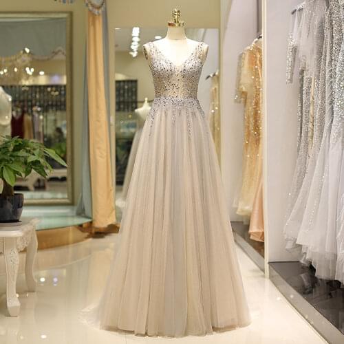 Wholesale Charming Champagne Beading Bodice Evening Dresses Long Sleeveless V Neckline Wedding Guest Gowns Back Out Affordable