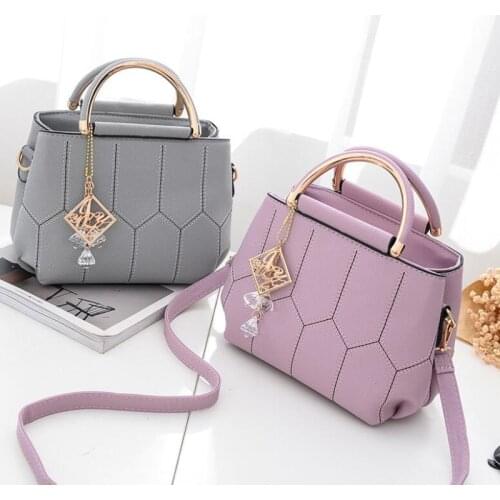 New womens bag portable Japanese and Korean version of the simple small square package Trend shoulder Messenger bag meikalou