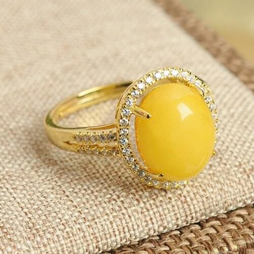 High-grade 925 silver inlaid honey wax Egg face ring genuine natural yellow honey amber ring retractable ring female models