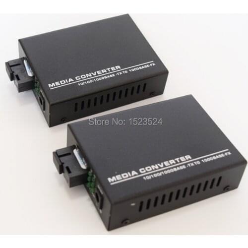 1 Pair 10/100/1000Mbps Fiber Optic Ethernet Media Converter Gigabite Single Mode Single Fiber with 4 RJ45 UTP and 1 SC Port