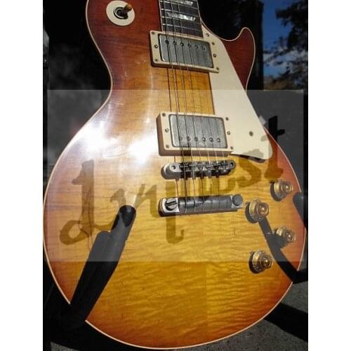 Lvybest logo,own designed shape,electric guitar with flame top, relic finished and old aged parts,small pin bridge.cherry burst