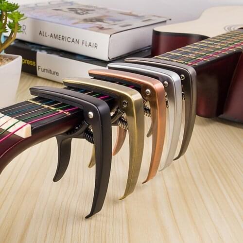 Zinc Alloy Guitar Capo Is A Capo Ballad Guitar Ukulele Gold Pullable String Nail Musical Instrument Accessories Parts