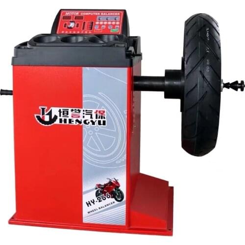 Motorcycle tire balancing machine
