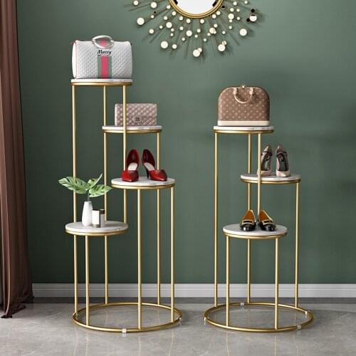 Clothing shop decoration display stand window display stand high and low shoes bag display stand marble island cabinet