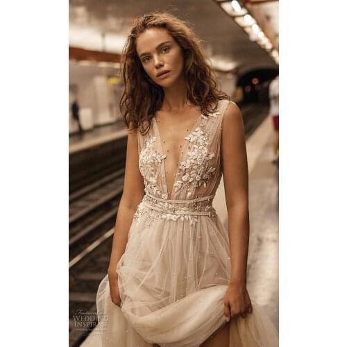 Sexy abito da sposa Beach Wedding Dress 2020 Sheer Neck Lace Applique Beaded Sweep Train Bridal Gown Backless Robe de mariee