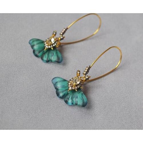 CSxjd Fashion hand painted Resin green flying butterfly personality temperament earrings