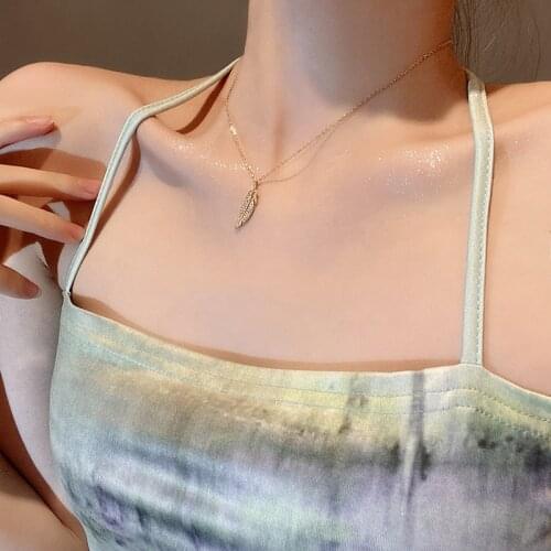 Micro-inlaid design sense feather clavicle chain net red Korean niche temperament necklace titanium steel zircon pendant