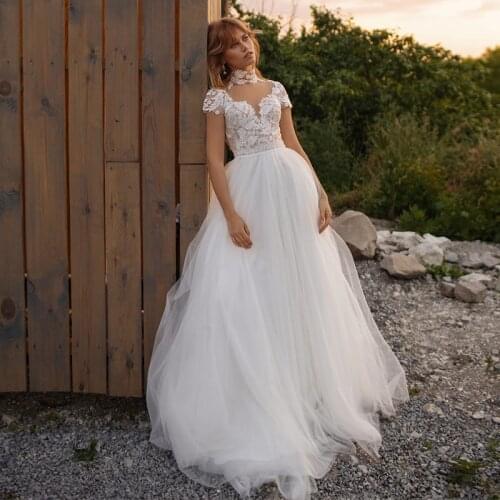 High Neck Wedding Dresses 2021 A-Line Tulle Short Sleeve Lace Appliques Sweep Train Charming Princess Bridal Gown Sexy Open Back