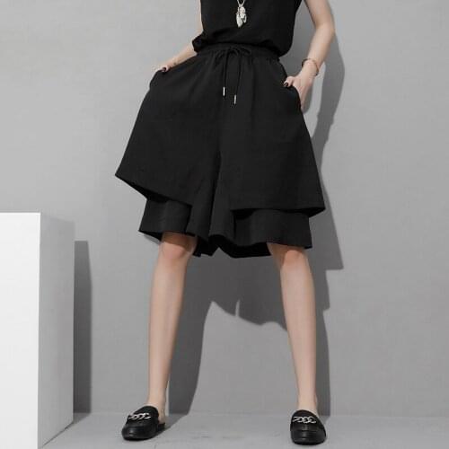 Street fashion brand personality irregular Wide Leg Trouser skirt 2021 summer thin elastic waist three dimensional cutting casua