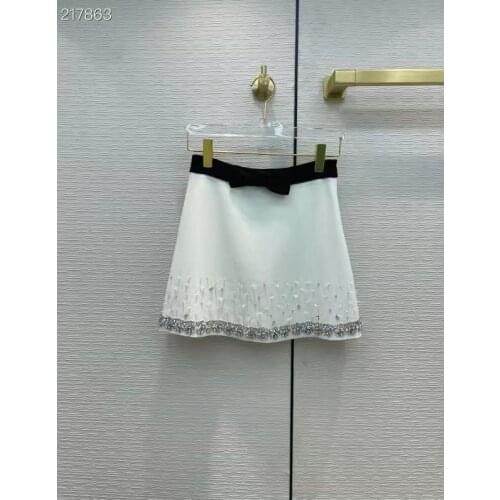 Fashion Women Skirts 2021 Runway Luxury Famous Brand European Bow Diamonds Beading Design Mini White / Black Ladies Skirt