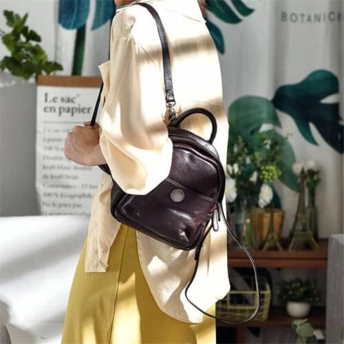 Retro simple womens genuine leather backpack top layer cowhide daily multifunctional backpack casual literary small backpack