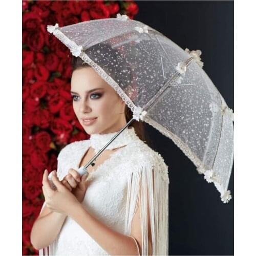Women bridal umbrella with stylish pattern on white