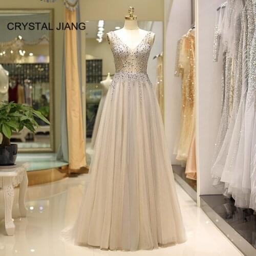 New Fashion Sexy v Neck Evening Dresses Long Sleeveless Heavy Beaded Tulle A Line Formal Long Evening Party Gown