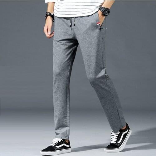 Hot sale sports pants mens loose straight leg autumn thin casual pants large size mens guard pants mens knitted long pants