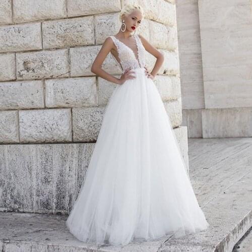 Charming Sleeveless A-line Wedding Gowns 2021 Sheer O-neck Appliques Sweep Train Plus Size Tulle Bridal Dress