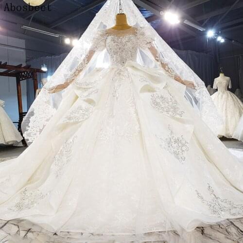 Vintage Style Puff Long Sleeve Wedding Dress 2021 Silver Embroider Lace Robe Mariee Long Train Wedding Gown Luxury Beads Puffy