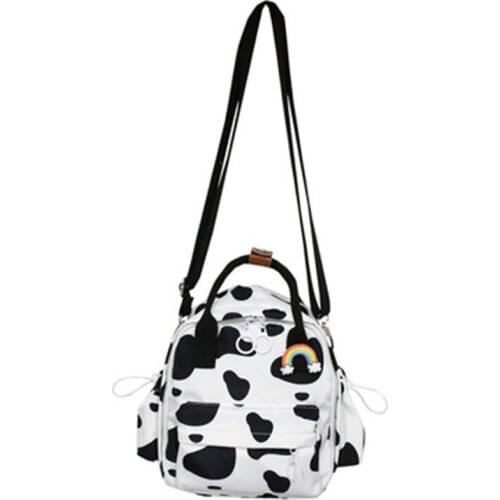 Small backpack female Korean version cute cow children dual-use messenger bag lightweight student travel backpack 2021 school