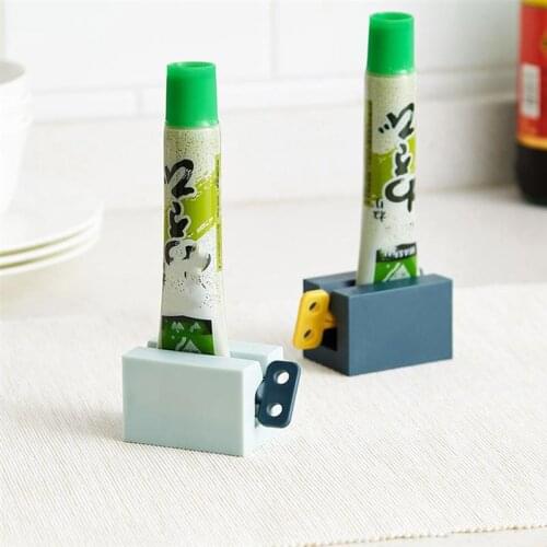 Multifunctional Manual Toothpaste Squeezer Bathroom Presser Squeezer Facial Cleanser Press Rolling Holder New