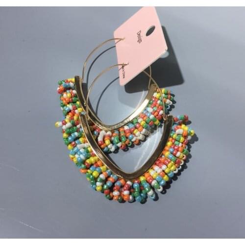 Creative fashion pop V-shaped tassel earrings with Bohemian hot hand woven rice bead earrings for women street pat earrings