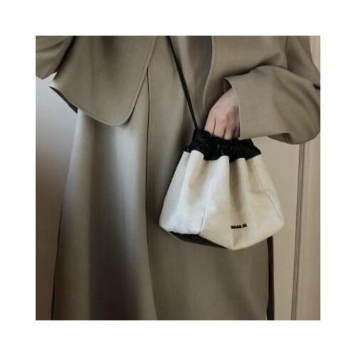 Niche Design Canvas Leather Dumpling Bag Ins Pull Rope Slant One Shoulder Wantan Women Bucket Bag Summer New J1