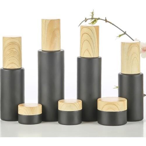 Black Frosted Glass Refillable Bottle Empty Cosmetic Container Skin Care Travel Eye Cream Spray Bottle with Wood Grain Lid