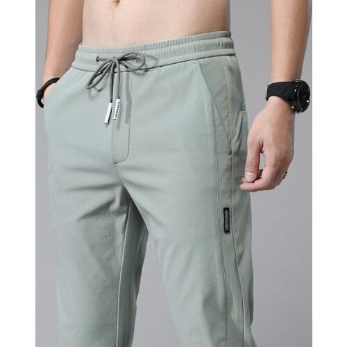 Quick Dry Man Jogging Korean Style Men Trousers Sportswear Thin Stretch Drawstring Streetwear Casual Pants 2021 Fashion Summer
