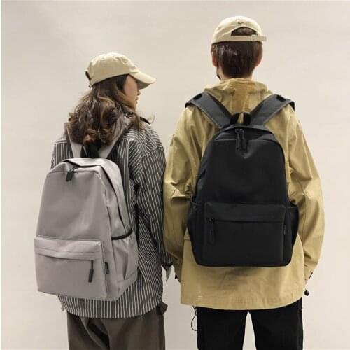 Large-capacity mens travel backpack, teen student schoolbag, black canvas waterproof womens work backpack, laptop backpack