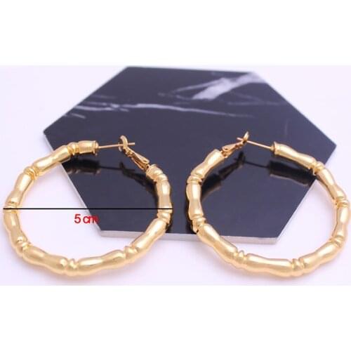 The popular golden round earrings exaggerated style is similar to the bamboo shape simple and fashionable earrings women jewelry