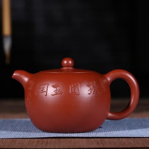 Teapot, is a gift for teapots and teapots made of purple clay with round pearls in Dahongpao, a hand-made raw mine