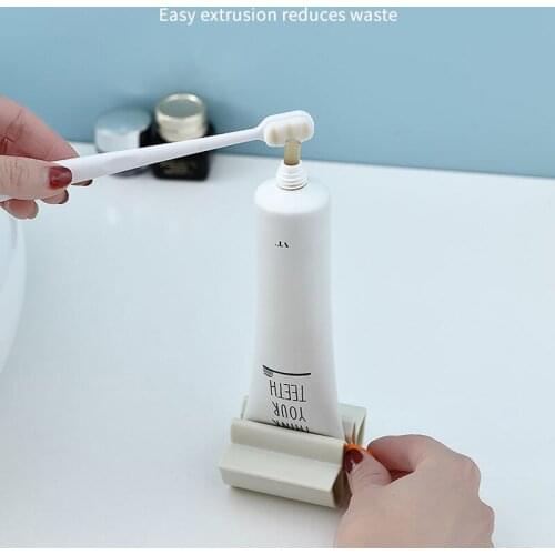 1Pcs Rolling Holder Manual Toothpaste Dispenser Toothpaste Tube Squeezer Portable Reuse Multi Purpose ABS Bathroom Accessories