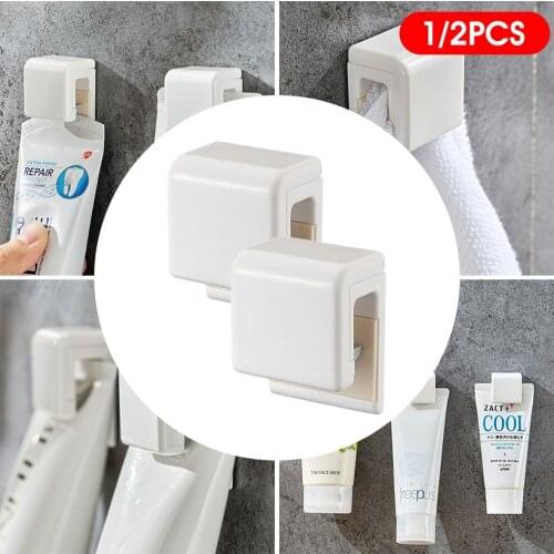 Adhesive Toothpaste Seamless Toothpaste Hanging Holder Clip Facial Cleanser Clip Wall Mount Self Adhesive Organizer Home Storage