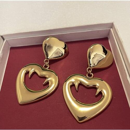 Vintage golden love peach heart-shaped ear clips, three-dimensional mirror exaggerated large pierced earrings