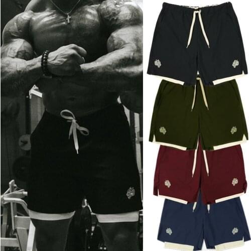 2021 New Double Decker Fitness Shorts Mens Breathable Speed Dry Stretch Trousers Fake Two Trousers