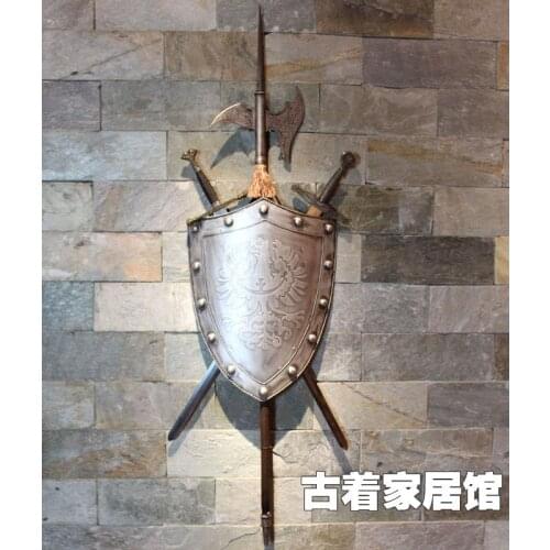 Retro bar decorations iron shield sword axe medieval Europeum Hotel Lobby Lounge