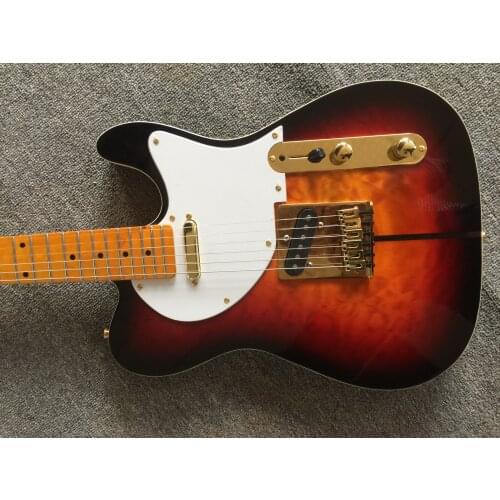 Free delivery / one piece splicing gold accessories high quality Guitar / China Electric Guitar