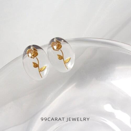 99 carat European and American fashion jewelry transparent Oval Pendant gold rose printing mysterious retro atmosphere Earrings