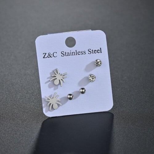 MEMOLISSA Stud Earrings
