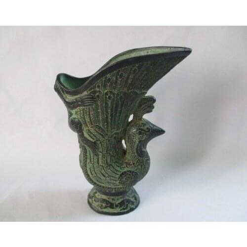 Ancient Chinese bronze palace royal wine glasses. The frog. The peacock cup