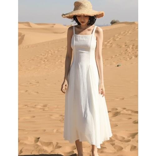 White Suspender dress Female Super Fairy Sexy Backless Lace Big skirt Temperament French Bellflower First love Mori long skirts